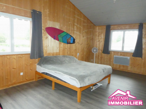Chambre confortable avec rangement – maison familiale Le Porge